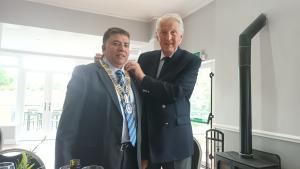Past President Robert Allan hands over office to incoming President Atif
